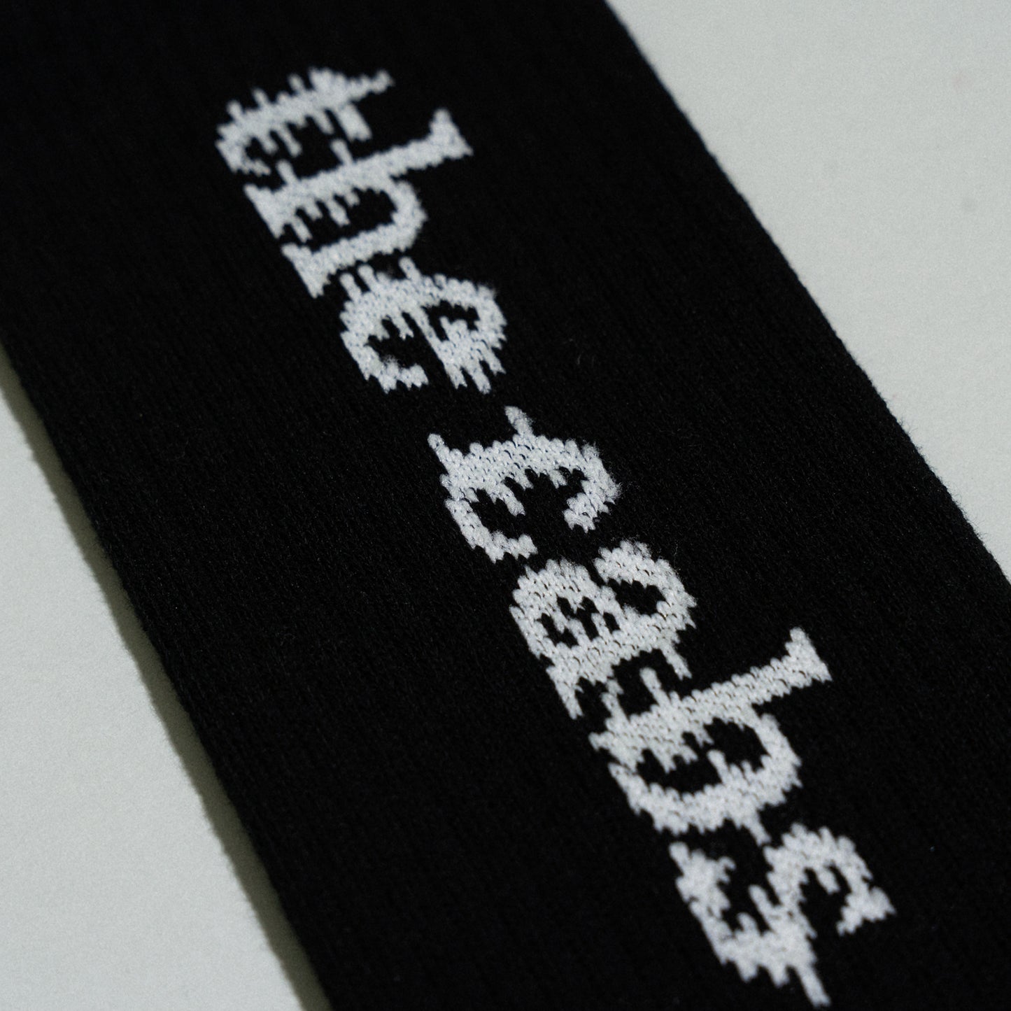 the cabs / Logo Jacquard Rib Socks